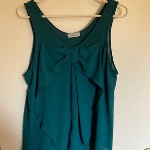 Emerald green tank-top blouse.